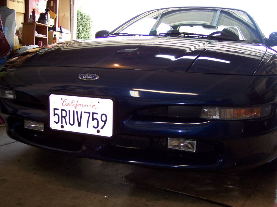 Dark blue Ford Probe front view with California license plate 5RUV759