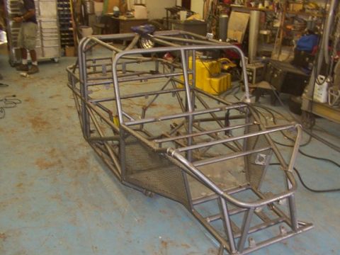 1978 Ford Bronco - This is the bare metal frame of a custom buggy, likely undergoing construction in a workshop setting.