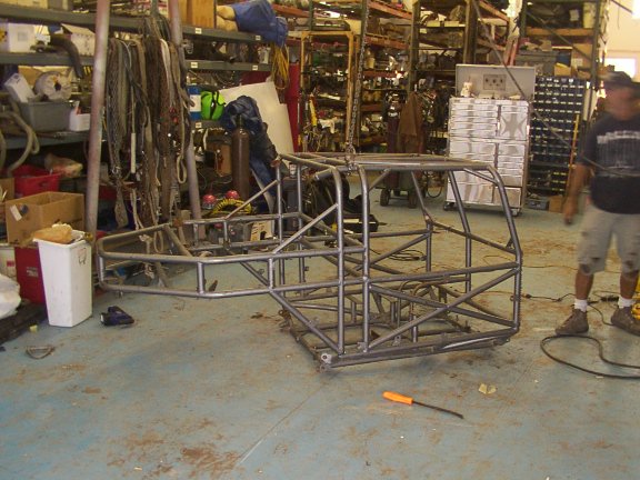 Custom tube chassis in workshop, viewed from side