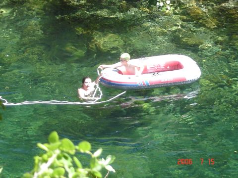 1993 Ford Bronco - People enjoying a day on the water with an inflatable raft.