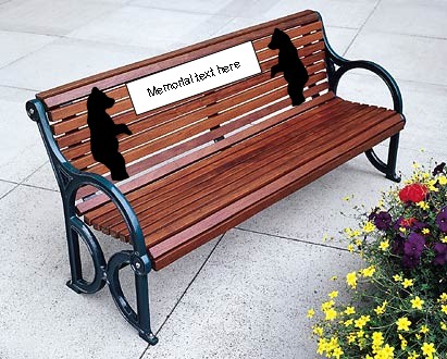 1976 Ford F-150 - A wooden park bench with decorative bear cutouts and a plaque for memorial text is shown outdoors.