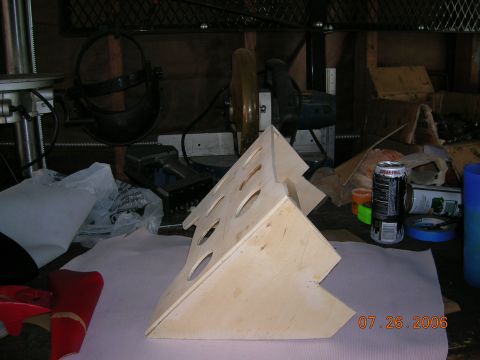 1985 Ford Bronco - A wooden holder designed for gauges sits on a workbench, dated 07.26.2006.