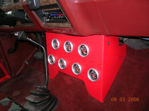 1985 Ford Bronco - Custom gauge pod installed in a vehicle's interior, showing seven gauges.