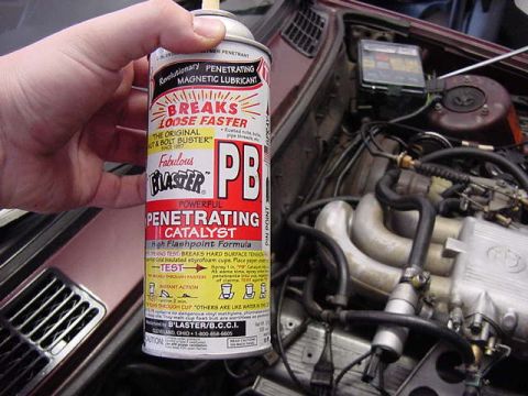 1984 BMW 3 Series - PB Blaster can held over the engine of a 1984 BMW 3 Series.