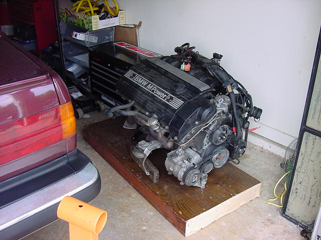 BMW M Power engine on wooden pallet