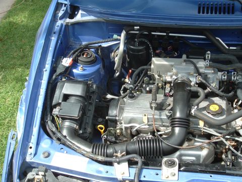 1995 Ford Aspire - Clean engine compartment, passenger side.