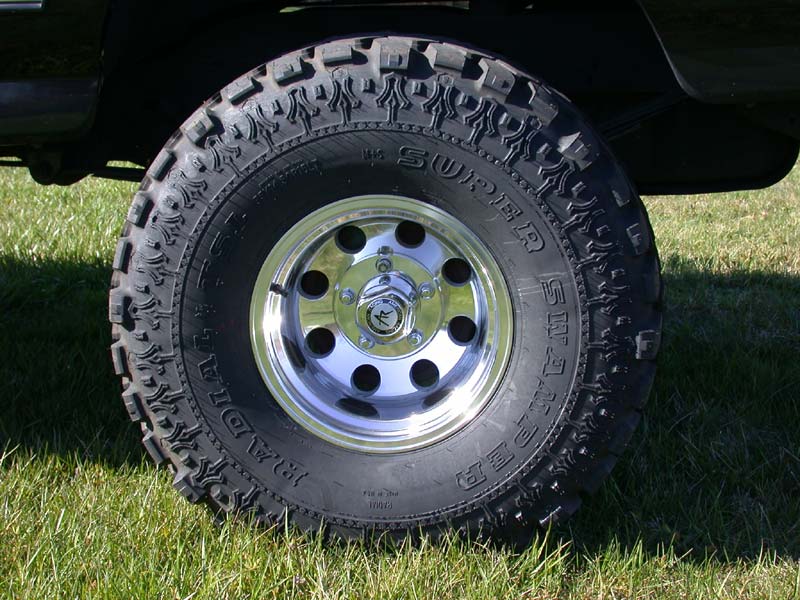 Radial Super Swamper mud tire on polished eight-hole aluminum wheel