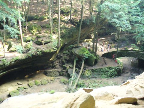 1991 Ford Probe - A scenic view of a gorge with a stone bridge and several people enjoying the natural landscape.