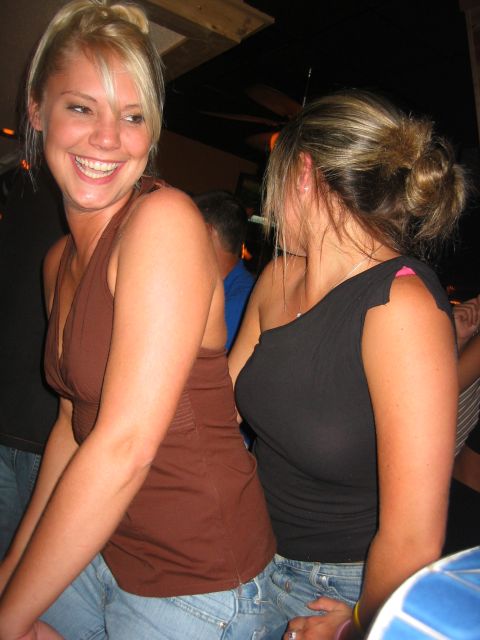 1989 Ford Bronco - Two women are enjoying themselves at a party.