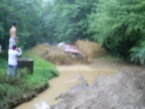 1979 Ford Bronco - little blurry... but hittin a big water mud pit...