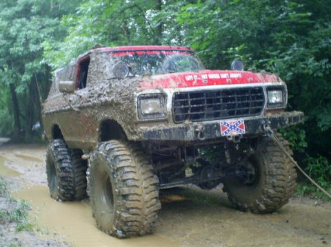 1979 Ford Bronco - This heavily modified 1979 Ford Bronco is covered in mud after driving off-road.