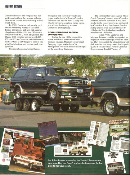 1984 Ford Bronco - A black Ford Bronco SUV is being transported on a trailer, with another vehicle visible to its right.