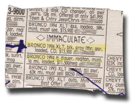 1996 Ford Bronco - Classified ad section from a newspaper lists several used Ford Bronco models for sale.