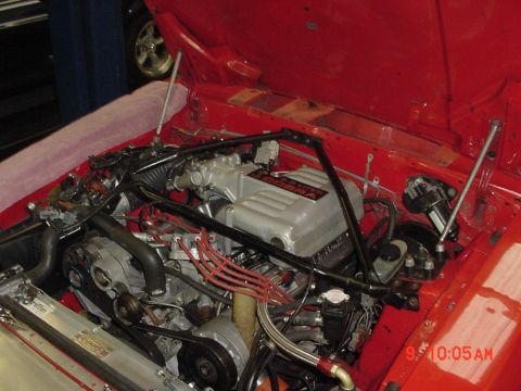 1993 Ford Mustang - Engine bay of a 1993 Ford Mustang, showing the Cobra intake and Griffin radiator.