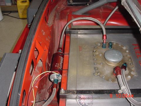 1993 Ford Mustang - Custom fuel cell and fuel filter installation with braided lines visible.