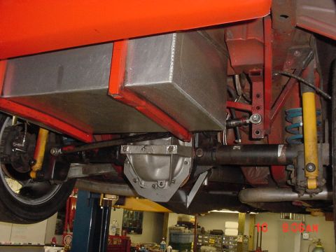 1993 Ford Mustang - Underside view of a 1993 Ford Mustang, showing the rear axle, fuel tank, and suspension.