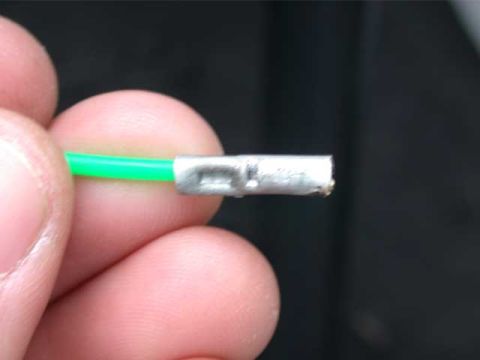 1996 Ford Bronco - Insert the "snake" end into one side of the crimp connector, and with your crimp tool, make sure you have a successful bite.