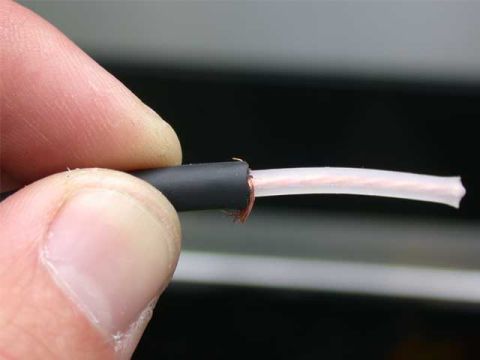 1996 Ford Bronco - Remove some of the outer cable, along with the shielding, exposing the core. Neatly trim of the braid.
