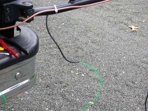 1996 Ford Bronco - Gently feed the coax in through the top hole, while ever so gently pulling the "snake" from the bottom. Use caution as not to slice the coa…