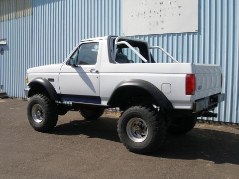 1994 Ford Bronco - Body lift cut down to 1". Topless