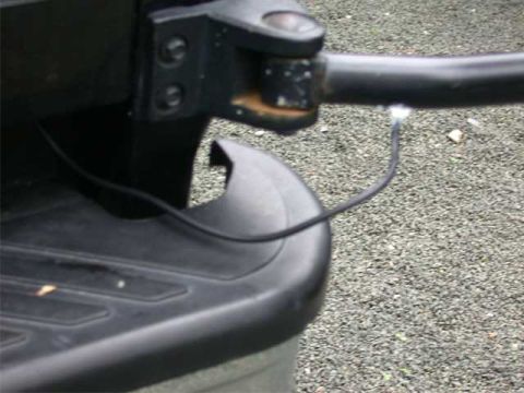 1996 Ford Bronco - Once the silicone is dry here, I'll snug the line up with a zip-tie.