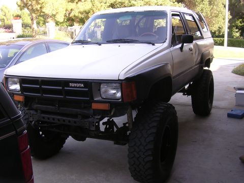 1985 Toyota 4Runner - This 1985 Toyota 4Runner features a lifted suspension and aggressive off-road tires, ready for any terrain.