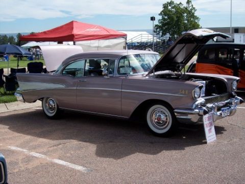 1972 Ford Ranchero - This 1957 Chevrolet Bel Air is displayed with its hood open at an outdoor event.