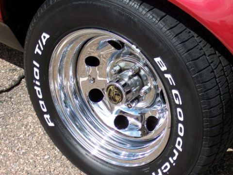 1972 Ford Ranchero - Close-up of a chrome wheel and tire with visible text on the sidewall.