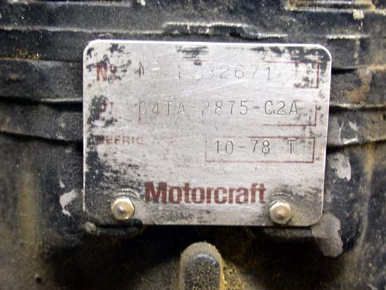 Motorcraft axle ID tag stamped D4TA 2875-C2A with 10-78 date code on a greasy housing