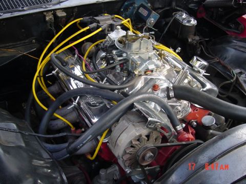 1997 Ford Probe - The engine bay features a V8 engine with yellow spark plug wires and a chrome air cleaner.