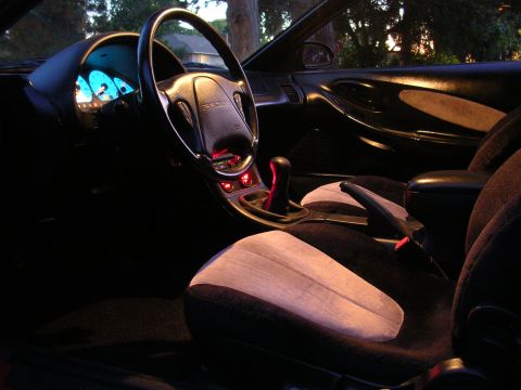1996 Ford Probe - The interior of a 1996 Ford Probe is illuminated by the glow of its dashboard lights.