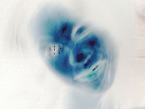 2001 Ford Crown Victoria - Abstract image with blue and white tones, possibly a blurred object or light effect.