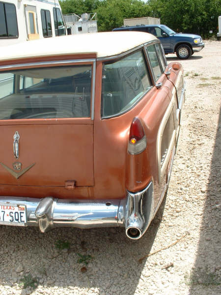 1972 Ford Ranchero - 1957 Cadillac station wagon with Texas plate 67 SQE. A blue SUV is visible in the background.