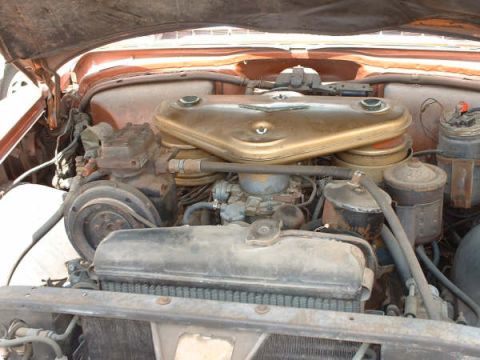 1972 Ford Ranchero - A view into the engine bay, showing the air cleaner housing and engine components.