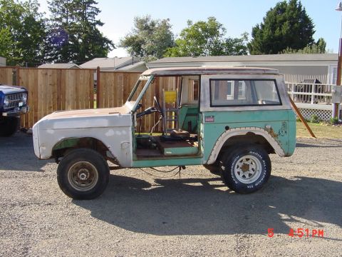 1991 Ford Explorer - This two-tone green and white Ford Bronco is missing its doors and appears to be undergoing restoration.