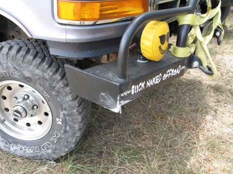 1995 Ford Bronco - Front view of a 1995 Ford Bronco showing the aftermarket bumper and tire.