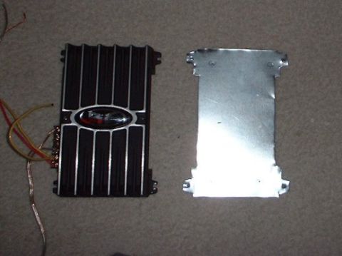 1993 Ford Taurus - New Rockford Fosgate punch X160.2 sub amp and cut-out amp bracket predrilled with new mount holes and old mount holes.