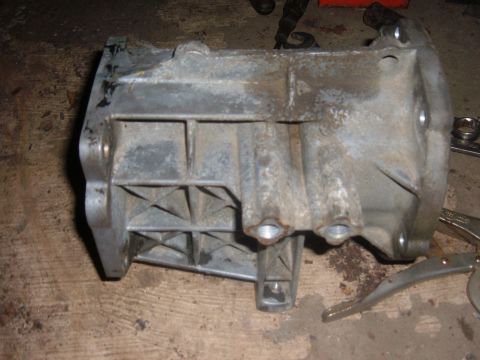 1985 Ford F-150 - This is a transmission housing, likely from a truck, with visible mounting holes and internal structural supports.