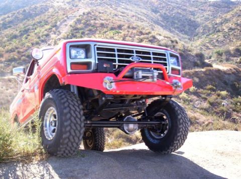 1995 Ford Bronco - This modified truck is equipped for off-road adventures with its lifted suspension and tires.