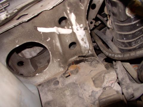 1990 Lincoln Town Car - The space between the rad and the sheet metal bulkhead is almost big enough to allow a fresh air tube through as is. The hole to the left i…