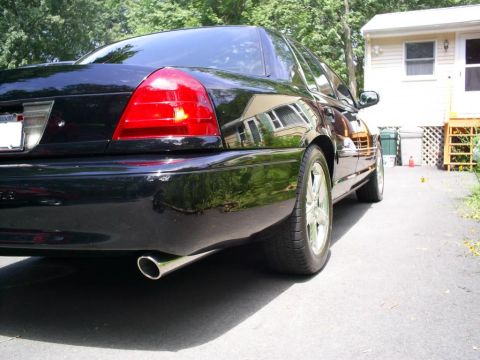 2003 Mercury Marauder - Rear view of a black 2003 Mercury Marauder parked on a driveway.