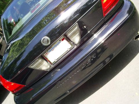 2003 Mercury Marauder - Rear view of a 2003 Mercury Marauder showing the trunk lid, taillights, and license plate area.