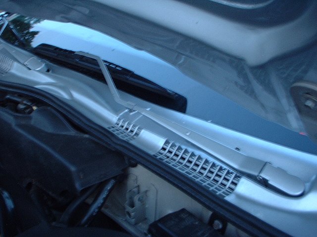 close up of painted cowl and wipers.