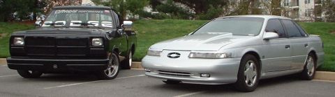 1993 Ford Taurus - truck next to SHO