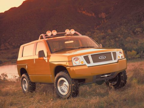 1989 Ford Bronco - This concept SUV features a unique grille and off-road lighting, presented in an outdoor setting.
