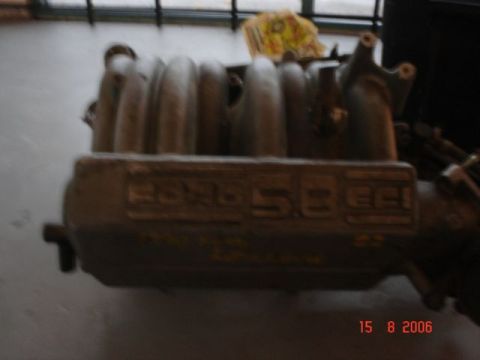 1990 Ford Bronco - Intake manifold with "Ford 5.8 EFI" cast into the side.
