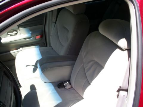 1995 Ford Crown Victoria - Front seats and door panel of a 1995 Ford Crown Victoria.