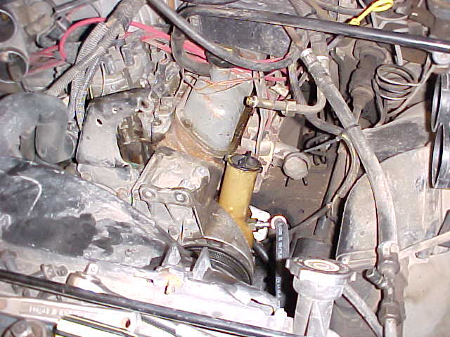 I had to remove the compressor in order to drain the oil from it when I swapped from R-12 to R-134A.  The swap was really easy to do.