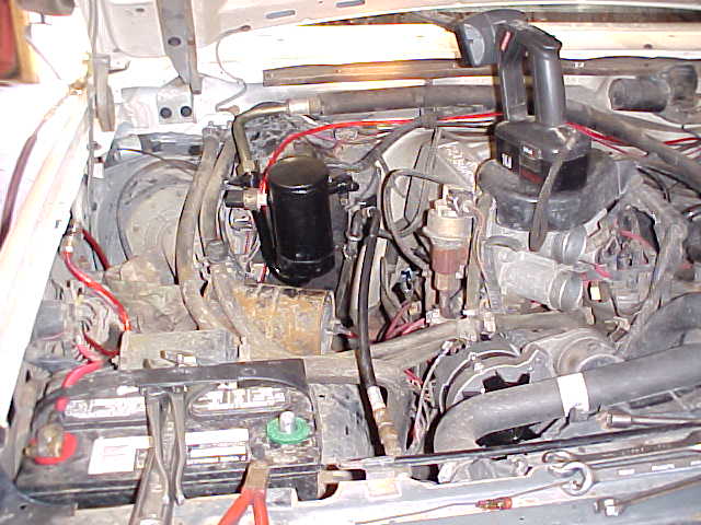 I also had to change to accumulator and the orifice tube.  Once that was done, it was just a matter of closing the system back up, vaccuuming it down to check for leaks, and then adding the R-134A and new oil.