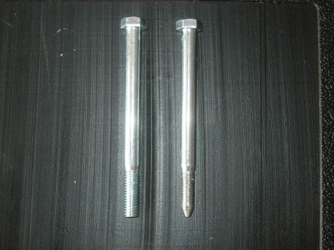1995 Ford Bronco - 3/8 x 4.5" bolts with the threaded ends tapered to make dropping the pins in the hinge much easier. Used a bench grinder to get the job don…